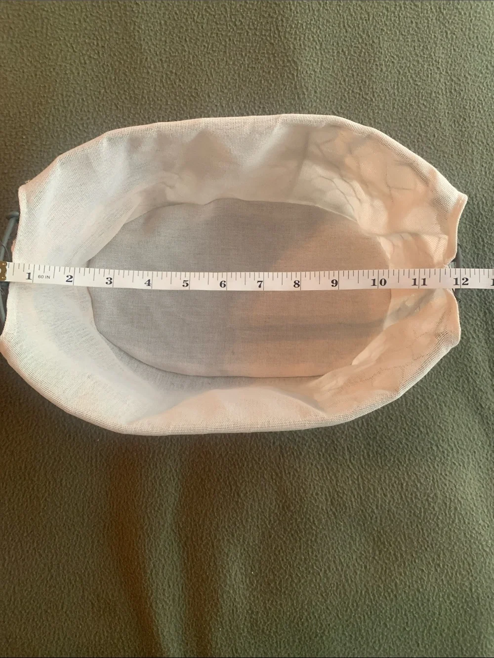 Cute gray & cream wire basket w/ wooden handles & lace details. 12” x 8” x 4.75”